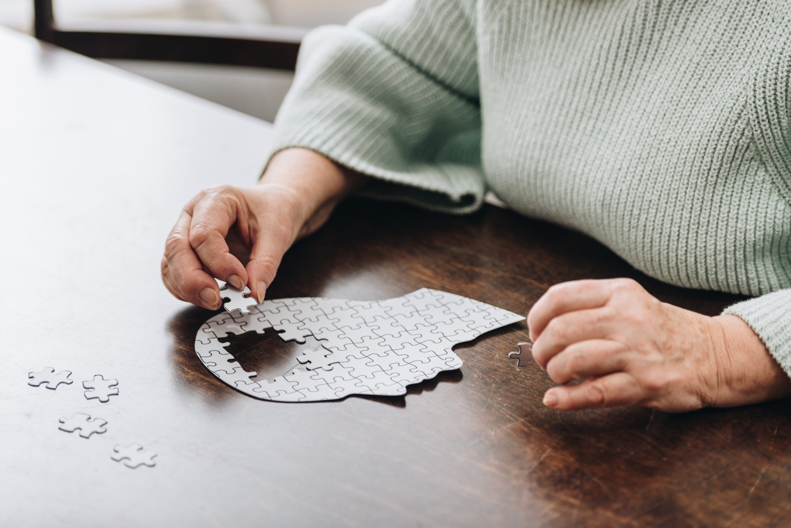 The Different Diseases That NAD+ IV Therapy Can Help Treat 1 cropped view of senior woman playing with puzzles 2022 12 16 18 57 46 utc scaled